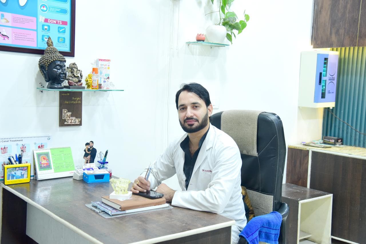 Dr. Aashish Malik at his desk